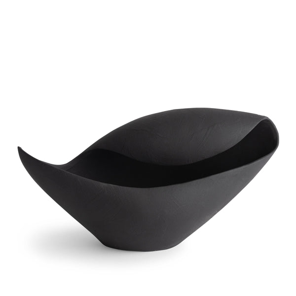The Bernard Bowl - Black by FlowDecor Inc. is a modern decorative bowl with a matte finish and an asymmetrical, pod-like shape, shown against a white background.