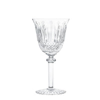 The Saint-Louis Tommy Stemware is a clear crystal wine glass with intricate cut-glass patterns on the bowl and base, a slender stem, and is displayed empty against a plain white background.