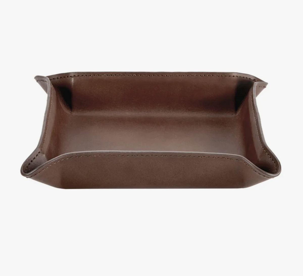 The Graphic Image Leather Valet Tray Medium, a rectangular brown leather tray with raised edges and curved corners, is ideal as a nightstand tray or men's organizer. Shown empty against a white background.