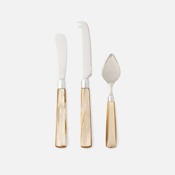 The Blue Pheasant Colson Cheese Knives Set of 3 features beige marbled handles and includes a cheese spreader, fork-tipped knife, and pointed cheese knife. Arranged upright on a white background, these knives are dishwasher safe.