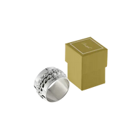 Babylon Silver Plated Napkin Ring Set 4 featuring a textured pebble pattern, shown with its square olive-green gift box.