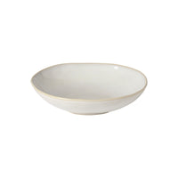 The Brisa Branca Dinnerware bowl by Casafina/Costa Nova is a shallow, round stoneware piece with a light beige finish, handcrafted in Portugal and shown on a white background.