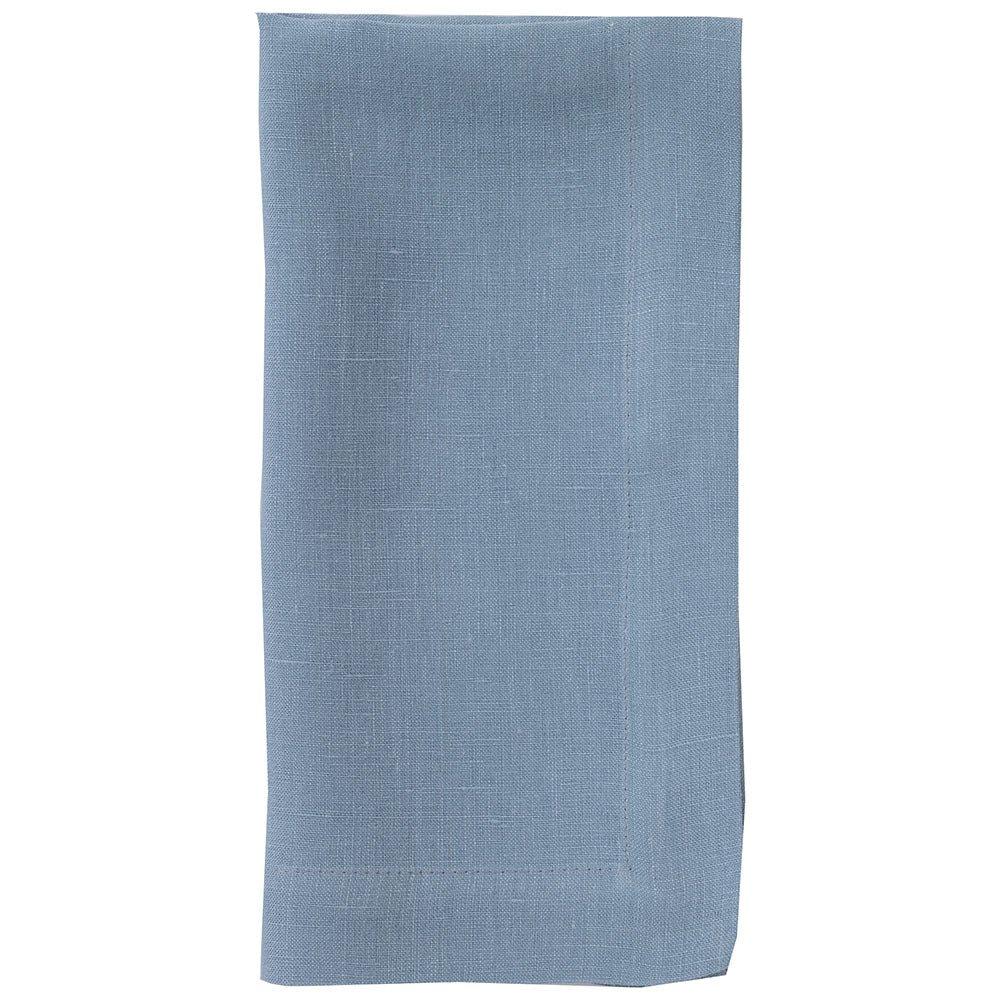 The Riviera Napkin Set of 4 by Bodrum features neatly folded, rectangular light blue stone-washed linen napkins with visible stitched borders, displayed on a white background.