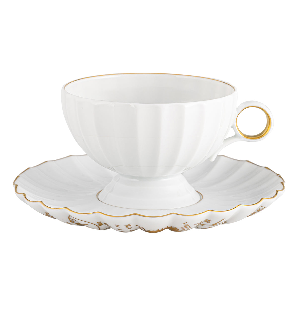 The Vista Alegre 200 Anos Dinnerware features a white ceramic teacup with a gold rim, scalloped gold-edged saucer, and hand-painted trim for modern elegance—an exquisite addition to any luxury table setting.