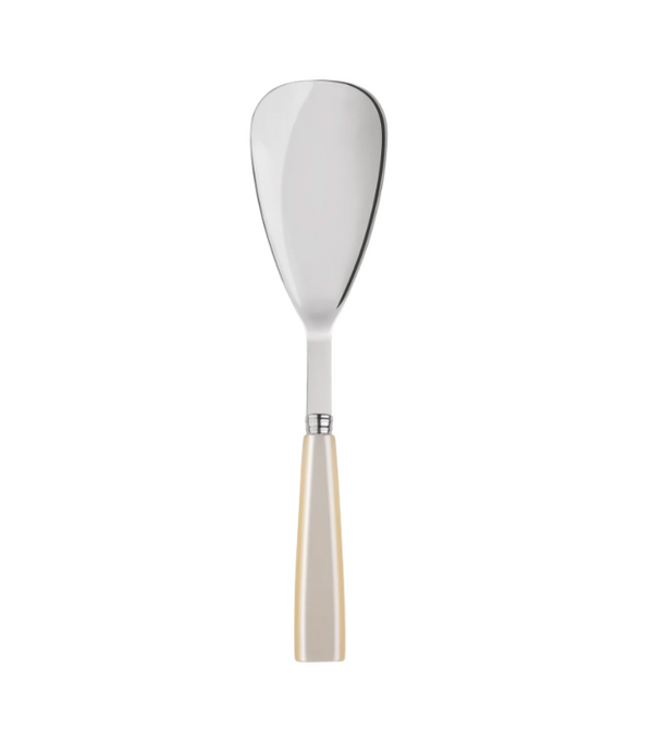 The Sabre Icone Rice Spoon - Pearl features a wide, flat, teardrop-shaped blade and a cream-colored handle—ideal for matching with similar flatware or pearled handle cutlery sets.
