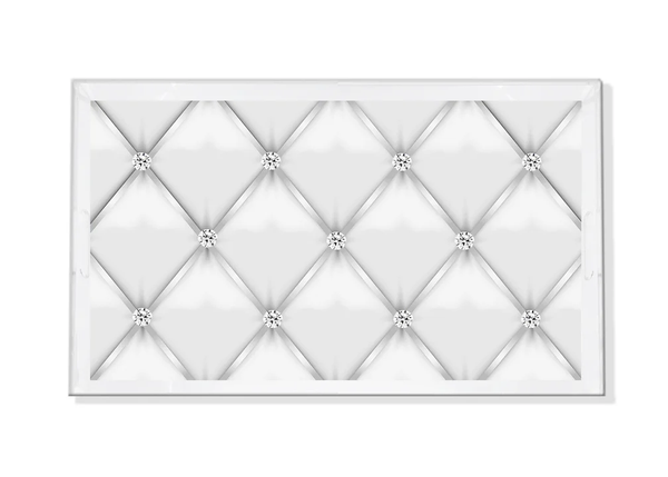 The Nicolette Mayer Tufted Silver with Diamonds Vanity Tray features a glossy white quilted design with silver studs, raised edges, and is ideal for displaying jewelry or organizing your vanity in elegant style.
