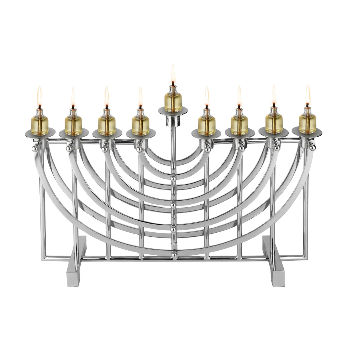 The Ricci Nickel Suspension Menorah features nine lit oil candles, including the central shamash, and stands tall in accordance with Jewish tradition against a plain white background.