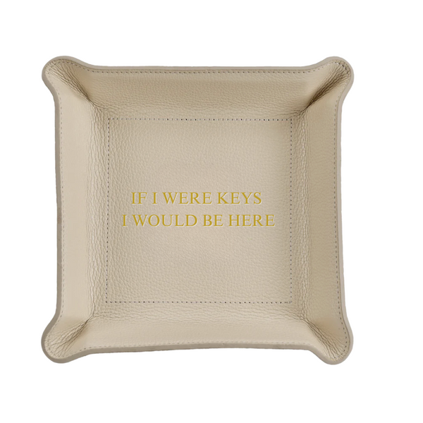 The Leather Valet Tray - If I Were Keys... by Graphic Image is a square beige leather tray with "IF I WERE KEYS I WOULD BE HERE" in gold, ideal as a stylish travel organizer.