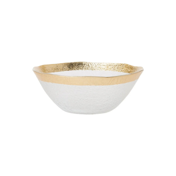 The Vietri Rufolo Glass Organic Bowl - Small features a textured white design, a metallic gold rim, and a gently wavy edge, displayed against a plain white background.