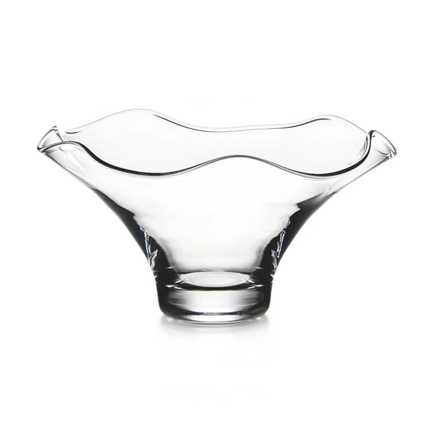 The Simon Pearce Chelsea Bowl is a clear handmade glass bowl with a wide, flared rim, wavy edge, smooth modern design, and sturdy circular base, shown against a white background.