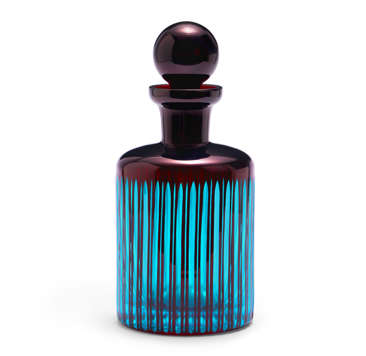 The Prism Decanter by L'Objet features vertical blue stripes and a deep red top, with a round stopper. This exquisite colored glassware stands out beautifully against a white background.