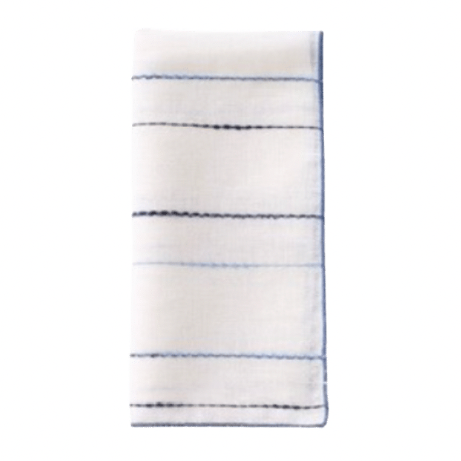 The Bodrum Porto Napkin Navy & Periwinkle Set of 4 features lightweight linen-blend napkins with thin blue and black horizontal stripes, neatly folded and displayed on a plain white background.