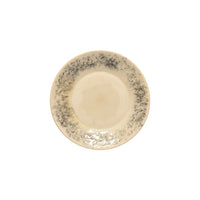 The Costa Nova Madeira Dinnerware Cream plate features a round stoneware design with a cream center and speckled dark gray rim, showcasing handcrafted Portugal-inspired elegance for an artisanal touch.