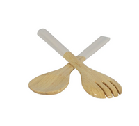 The Albert L Bamboo Classic Salad Servers Set - Small features two elegant bamboo servers, one spoon and one fork, with light-colored handles, crossed on a white background—perfect for any meal.