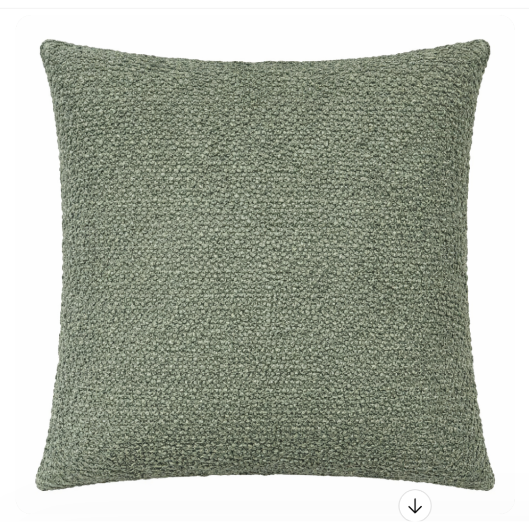 The Decor Fifty-Five Angelina Pillow Forest is a square, boucle-textured green accent pillow with a curly surface, shown against a plain white background.