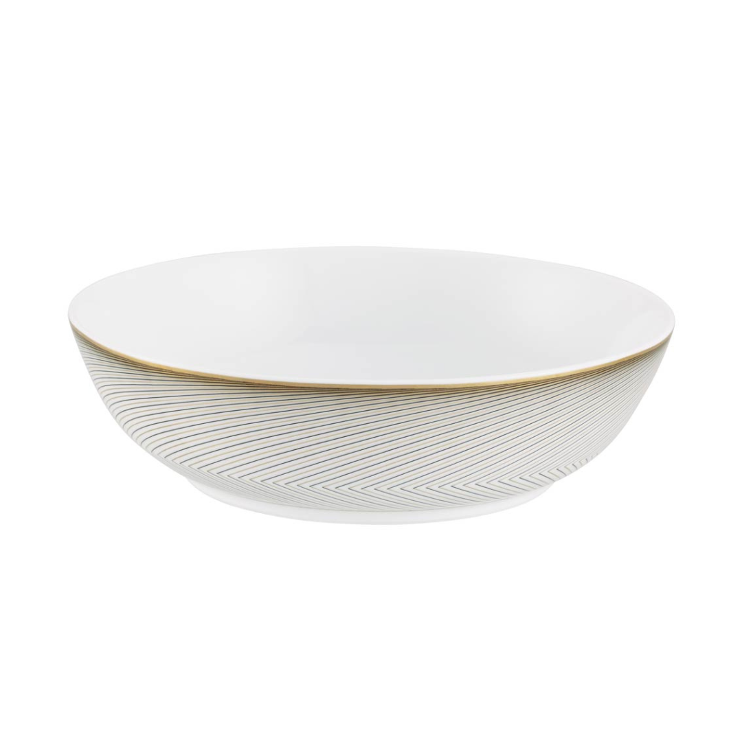 The Oskar Dinnerware bowl by Raynaud is crafted from white Limoges porcelain, featuring a subtle gold rim and delicate gold diagonal lines forming a geometric pattern around the exterior. Pictured on a white background.