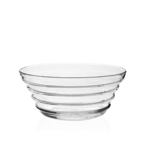 The William Yeoward Ripples Serving Bowl 10" features horizontal ridges and sits on a white background, elegantly displaying the beauty of handmade crystal glass.