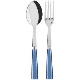 The Sabre Icone Serving Set features a metal spoon and fork with shiny surfaces and blue handles, displayed side by side on a light background to highlight the sleek design of this modern cutlery.