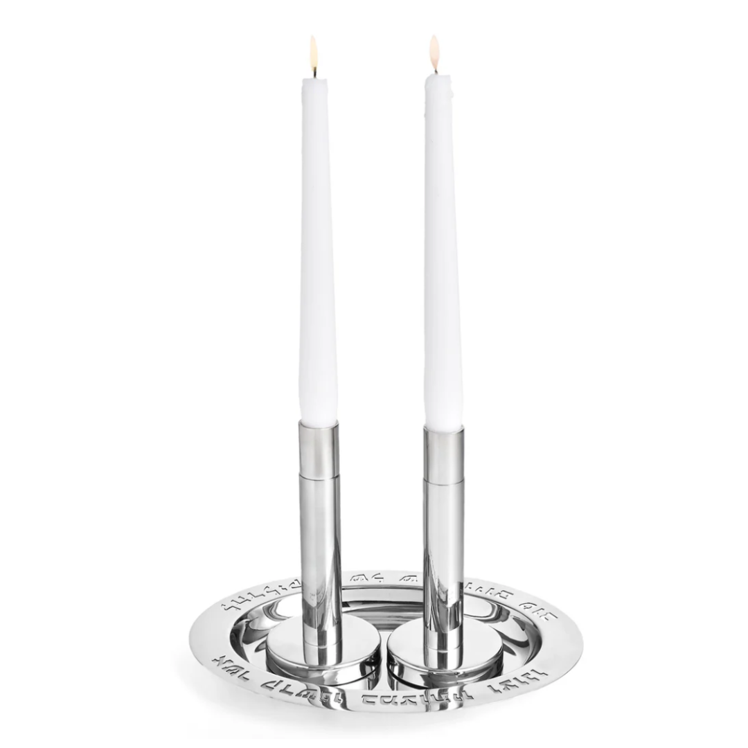 The Godinger Shabbat Tray with Candlesticks features two lit white tapers in modern silver holders on an engraved tray, perfect for elegant Shabbat celebrations.