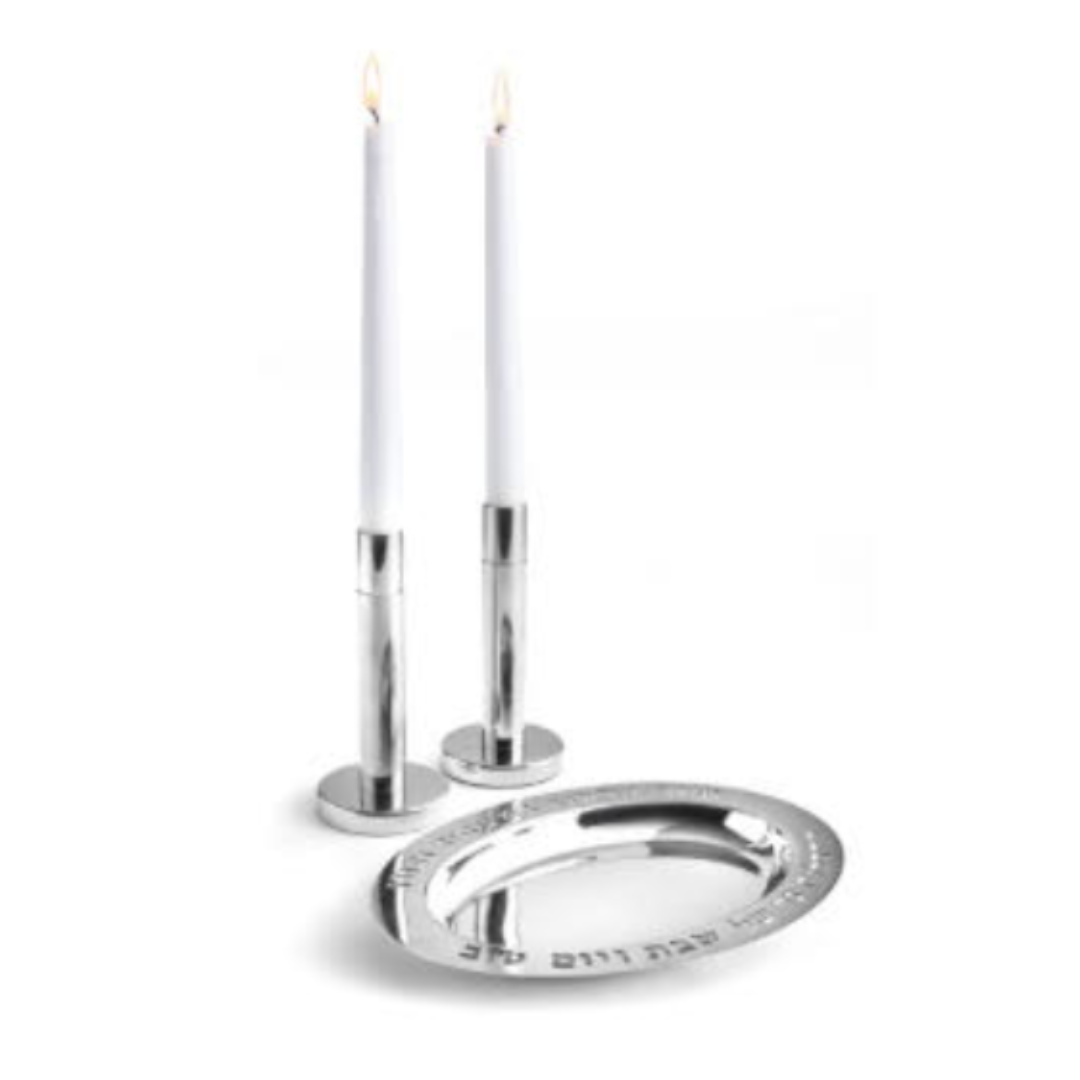 The Godinger Shabbat Tray with Candlesticks features two white candles in silver holders on a round tray with Hebrew text, beautifully displayed on a white background—ideal for your Shabbat celebrations.