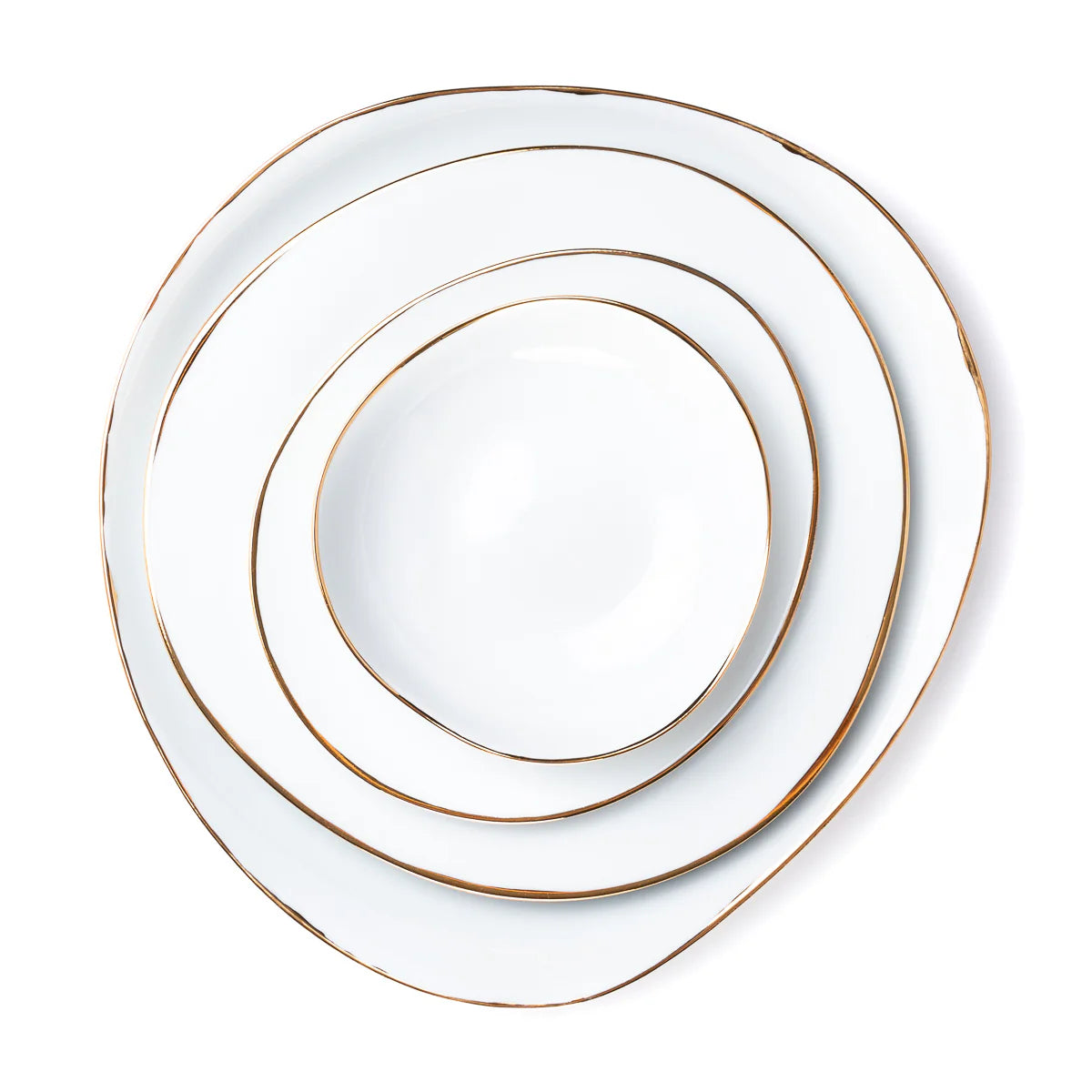 Four irregularly shaped white Simply Gold Dinnerware plates by Molecot, each with gold rims, are stacked concentrically from largest to smallest and viewed from above on a white background.