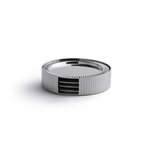 The Anna New York Striations Silver Coasters Set of 4 in Holder features round, ribbed metal coasters with exposed inner layers, resembling modern stainless steel, displayed on a white background.