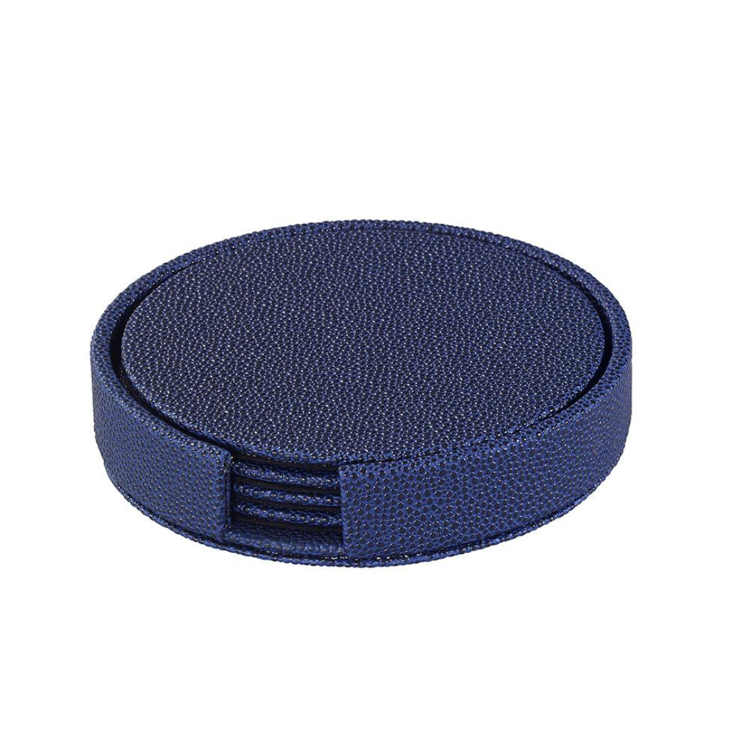 The Bodrum Skate Coaster Set of 4 features round, blue, textured Phthalate-Free Vinyl coasters in a matching holder with a small side opening for easy access.