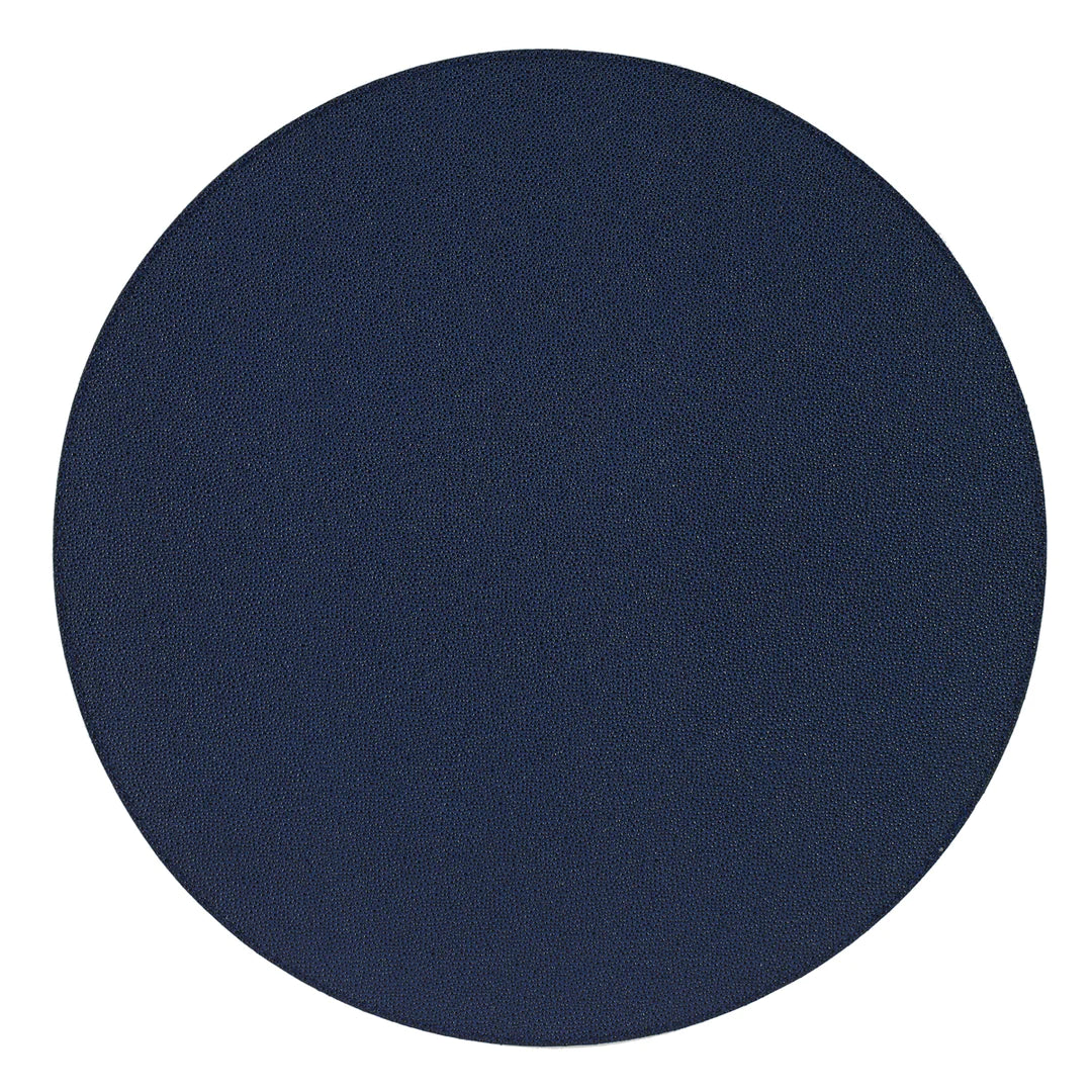 The Bodrum Skate Round Placemat Navy Set of 4 features plain, dark blue circular vinyl placemats with a subtle textured surface, shown on a white background.
