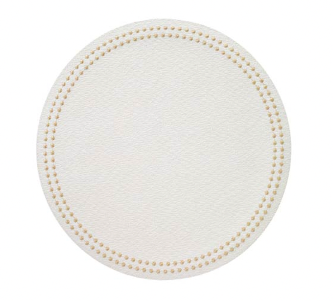 The Pearls Round Placemat Set of 4 by Bodrum features round, white, phthalate-free vinyl placemats with a textured surface and two concentric circles of tan dots along the edge, shown against a white background.