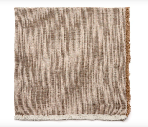 A brown and cream herringbone blanket with white and brown fringe, shown flat on a white background—ideal for pairing with the Deborah Rhodes Herringbone Coffee Fringe Napkin Set of 4.