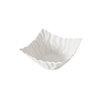 The PAMPA BAY Mascali Snack Bowl Square is a white porcelain bowl with a textured rim and wavy edges, displayed on a plain white background.