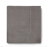The Sferra Festival Tablecloth is a neatly folded, gray linen tablecloth with a hemstitch border detail, displayed on a white background.