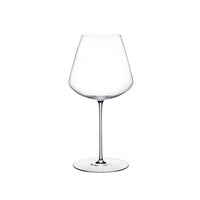 A clear Stem Zero Elegant Red Wine Glass by Nude Glassware, featuring a wide bowl and thin stem, is centered on a white background.