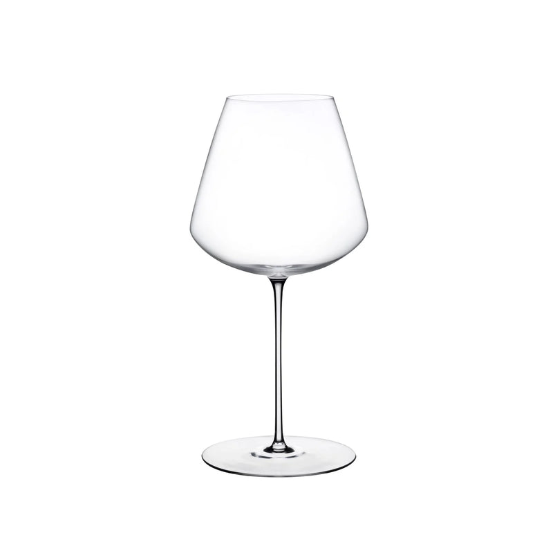 A clear Stem Zero Elegant Red Wine Glass by Nude Glassware, featuring a wide bowl and thin stem, is centered on a white background.