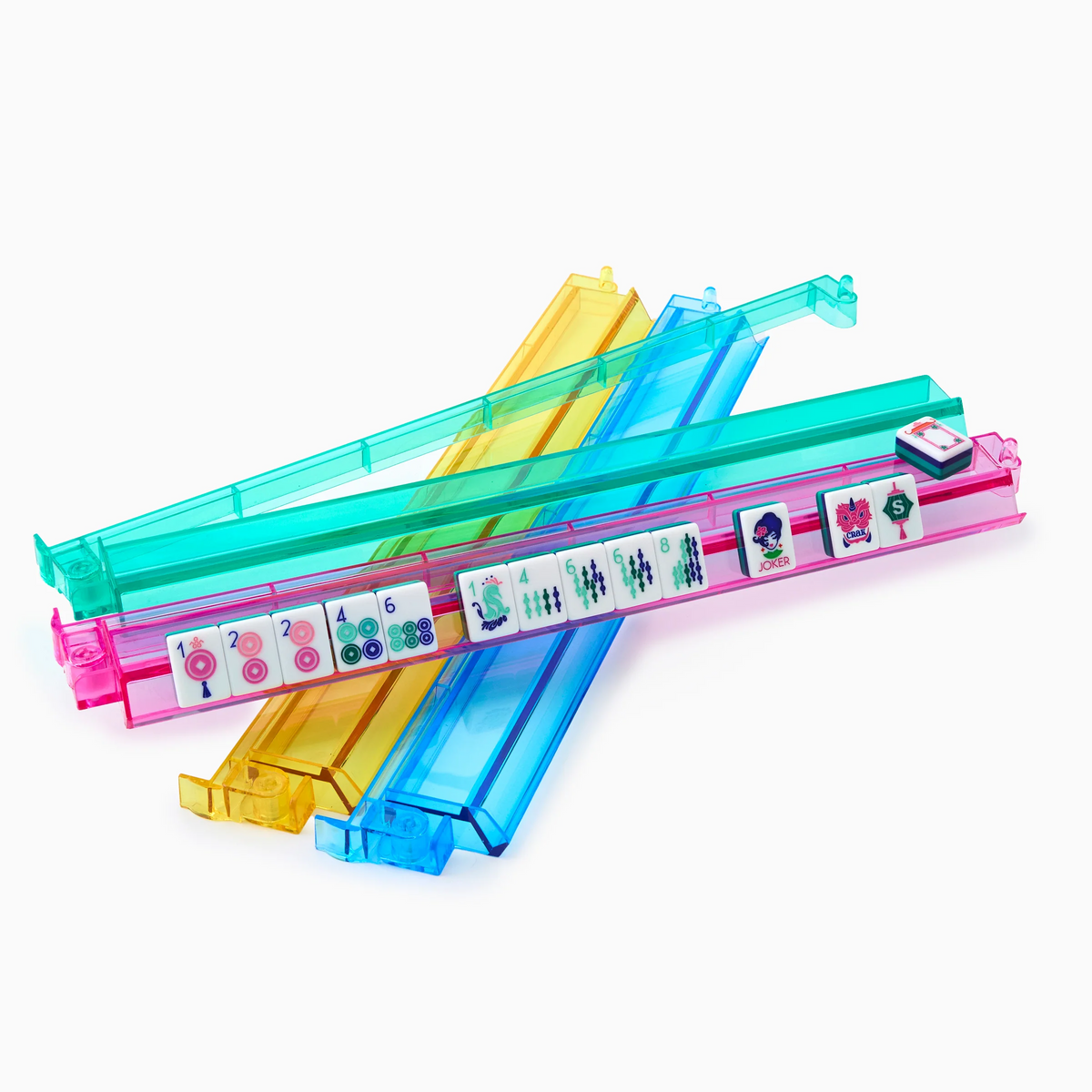 The Oh My Mahjong Mahjong Rack & Pusher Set - Multi includes three transparent acrylic racks in pink, yellow, and blue. The stylish racks also function as pushers, with mahjong tiles shown on the pink rack for display.