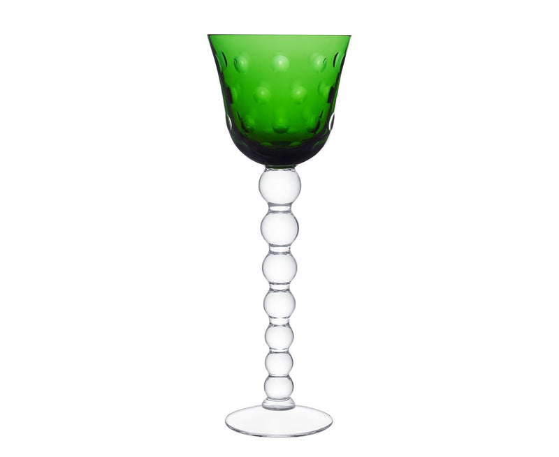 The Saint-Louis Bubbles Hock Stemware features a green, textured dimpled bowl and a clear stem of stacked glass spheres on a round base, capturing the modern elegance of contemporary crystal tableware.