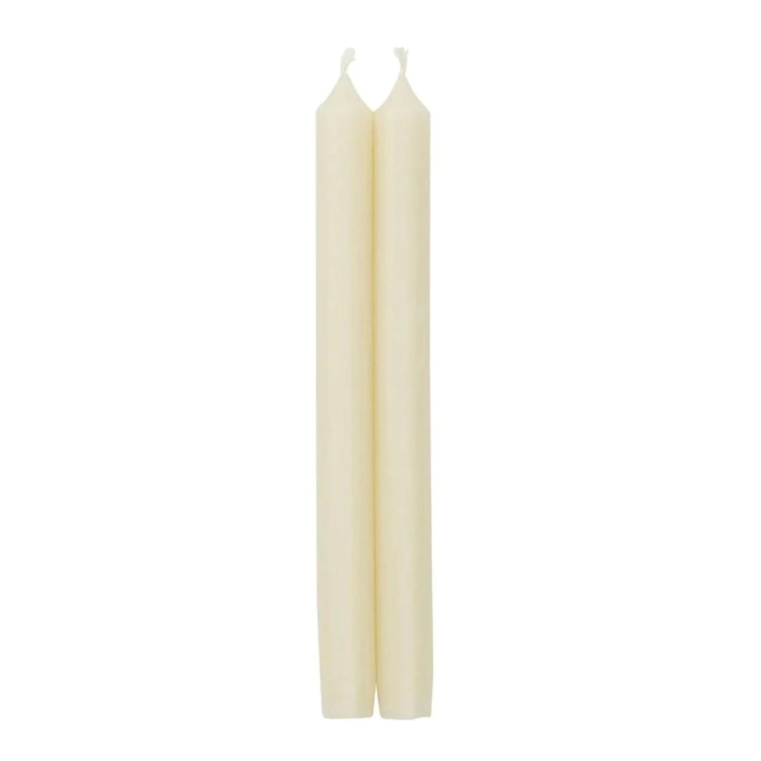 The Caspari Crown White Taper Candle Set features two cream-colored, smokeless and dripless candles standing upright side by side with untouched wicks, set against a plain white background.