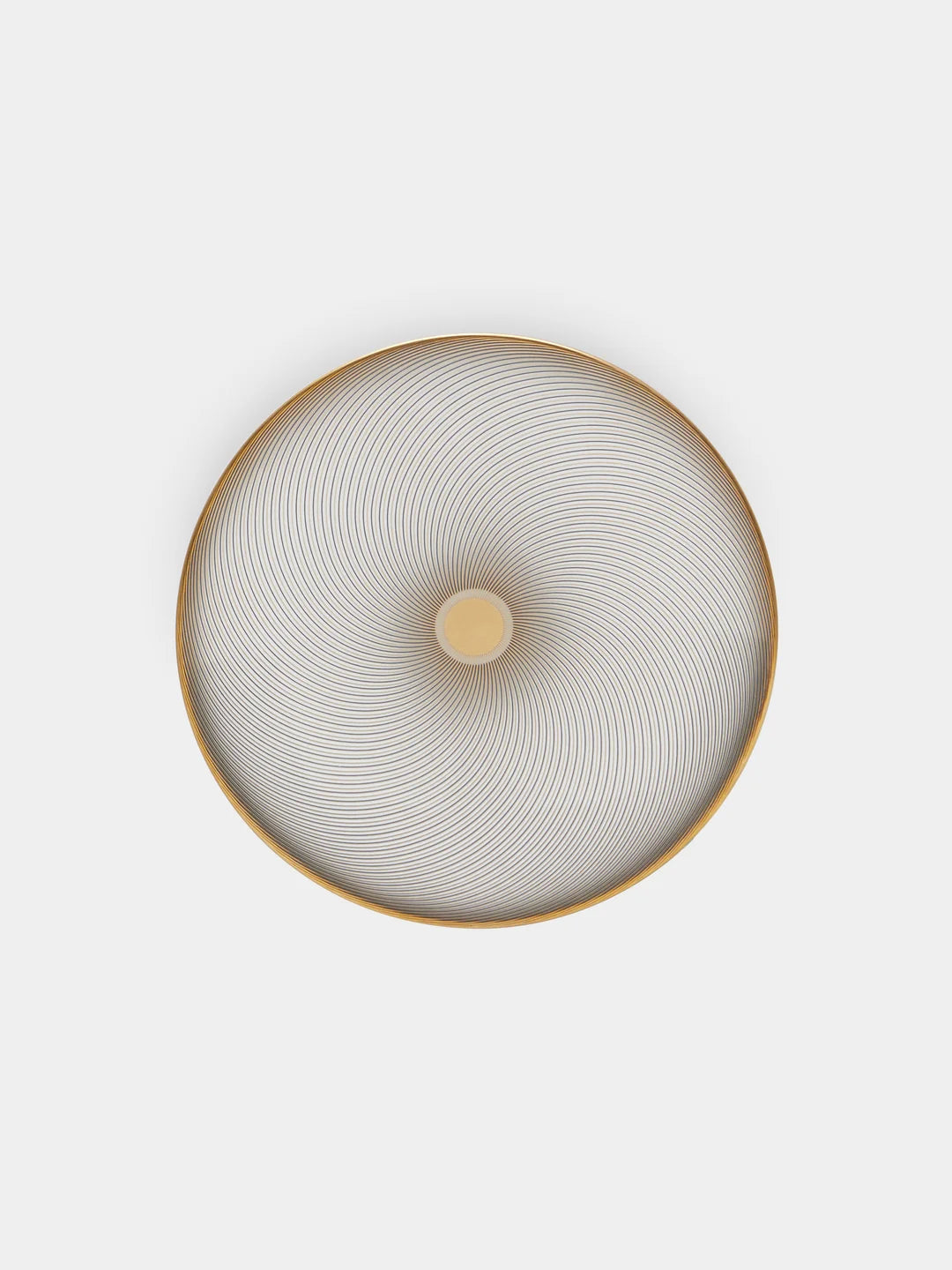 A circular piece from the Oskar Dinnerware collection by Raynaud, adorned with fine, concentric rings radiating from a central hub and reminiscent of Limoges porcelain craftsmanship, is displayed against a plain white background.