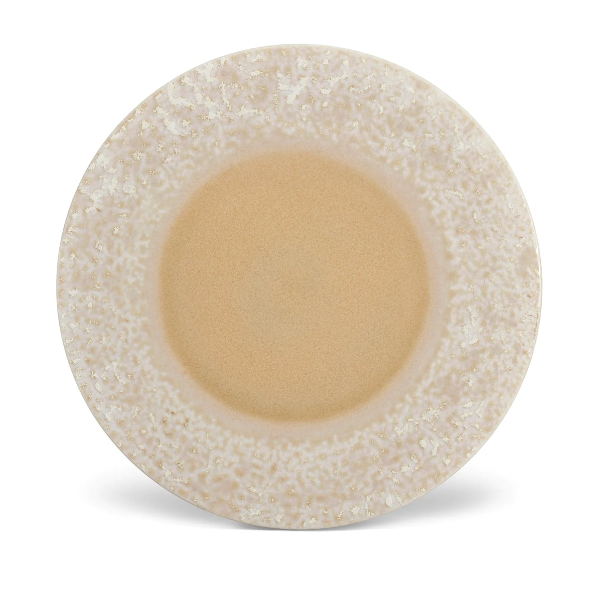 The Terra Platter Charger Dusty Rose by L'Objet features a smooth tan center and a textured, speckled beige and white rim, displayed on porcelain placemats from an overhead view against a white background.