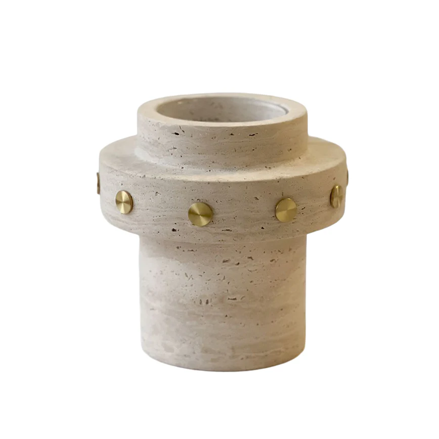 The Tulsa Vase by BT-Shalom is a travertine and brass cylindrical vase featuring a stepped design, gold studs, and the modern charm of a unique stone accessory.