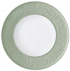 The Mineral Irise Dinnerware - Celadon plate by Raynaud features a textured light green rim and smooth white center, crafted from Limoges porcelain and shown from above.