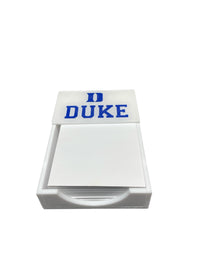 The College Note Pad by Eye Candy is a white custom holder with blank sheets, featuring "DUKE" and a bold blue D on the lid—an ideal graduation gift or college accessory.