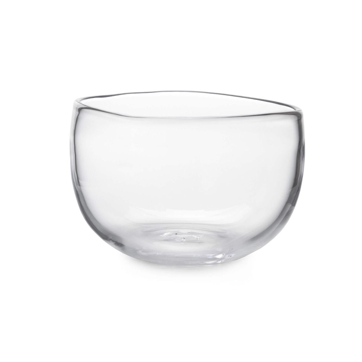 The Burlington Bowl by Simon Pearce is a clear, round handmade glass bowl with slightly uneven edges and an organic design, shown on a plain white background.
