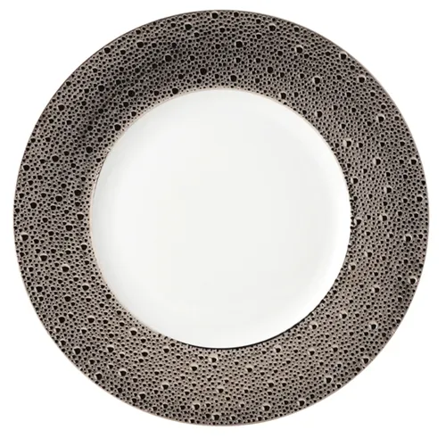 The Ecume Platinum Dinnerware by Bernardaud features a white plate with a textured gray and black rim, bringing elegance to any modern table setting.