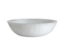 The Whitney Resin Bowl - White 19.5" by BIDK Home features a shallow, round design with a smooth matte finish, making it a striking decorative accent against a plain white background.