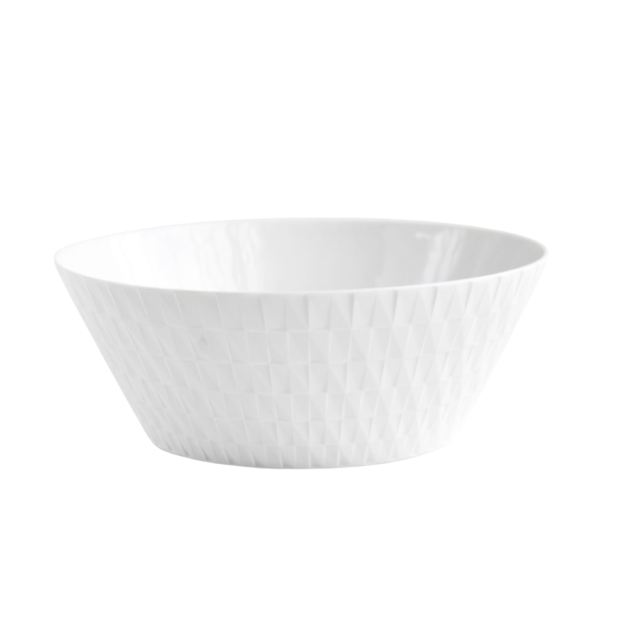 The Bernardaud Twist Salad Bowl - 10" is a white ceramic bowl featuring a subtle, origami-inspired geometric exterior pattern, displayed on a plain white background.
