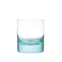 The Moser Whiskey Set DOF Glass 370 ml, a cylindrical tumbler crafted from lead-free crystal with a thick, light blue-tinted base, is shown empty against a white background.