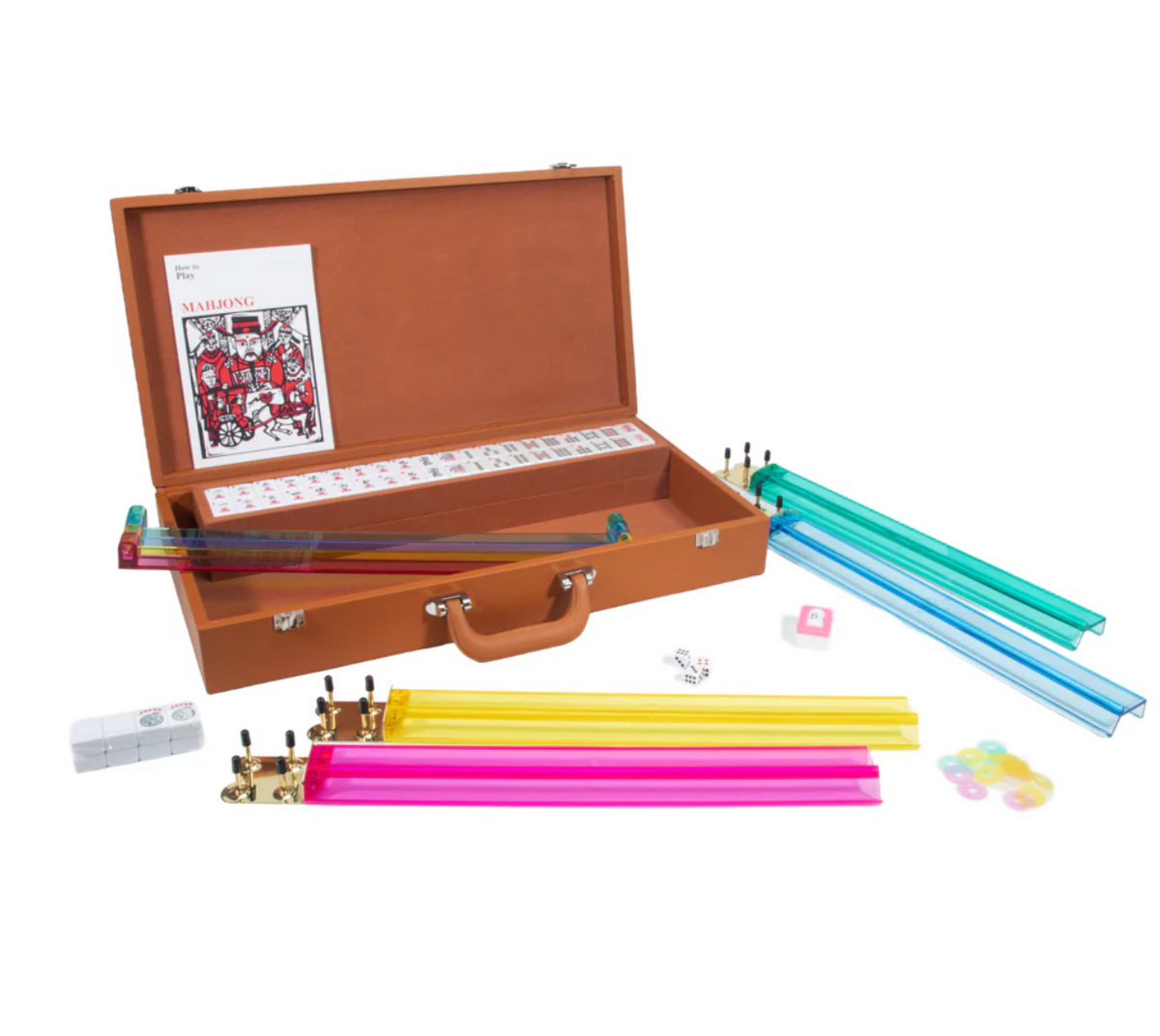 The Ellen Mahjong Set - Saddle by Brouk & Co includes a brown vegan leather case, vibrant racks, tiles, dice, chips, and a rulebook—each neatly arranged around the open box for easy play.