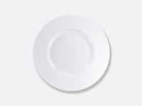 The Bernardaud Ecume White Dinnerware plate, made of Limoges porcelain with a subtly textured wide rim, is shown from above on a plain light gray background.