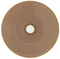 The Tresor Dinnerware Beige by Raynaud is an 8 3/4-inch round porcelain plate with a woven geometric brown pattern radiating from a white center and finished with a slim gold rim, bringing elegance and visual intrigue to your table setting.